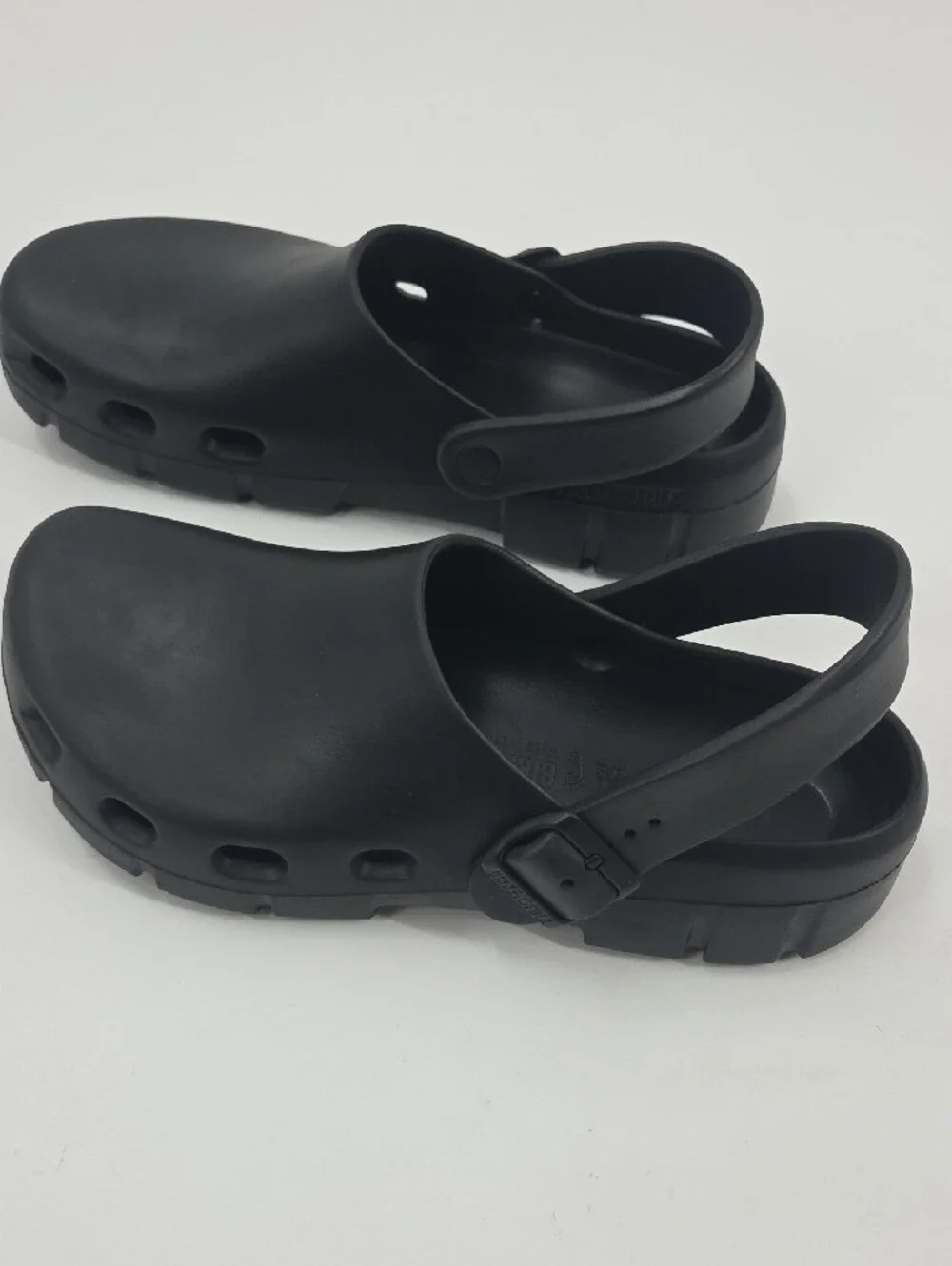 Birkenstock Black Foam Clogs with Heel Strap